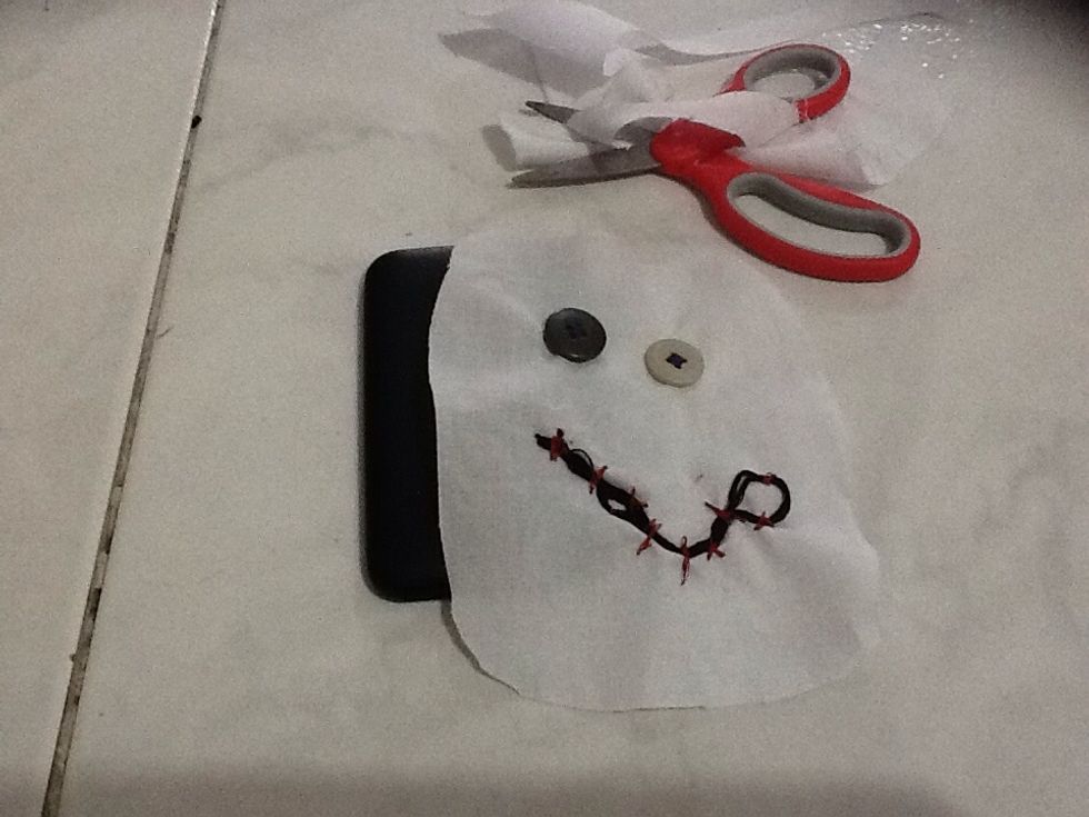 Trim the fabric while sizing up to the case