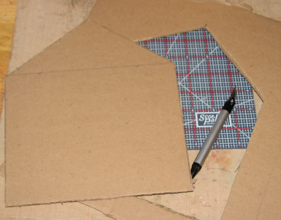 Trim the house from the rest of the chipboard using a sharp craft knife.