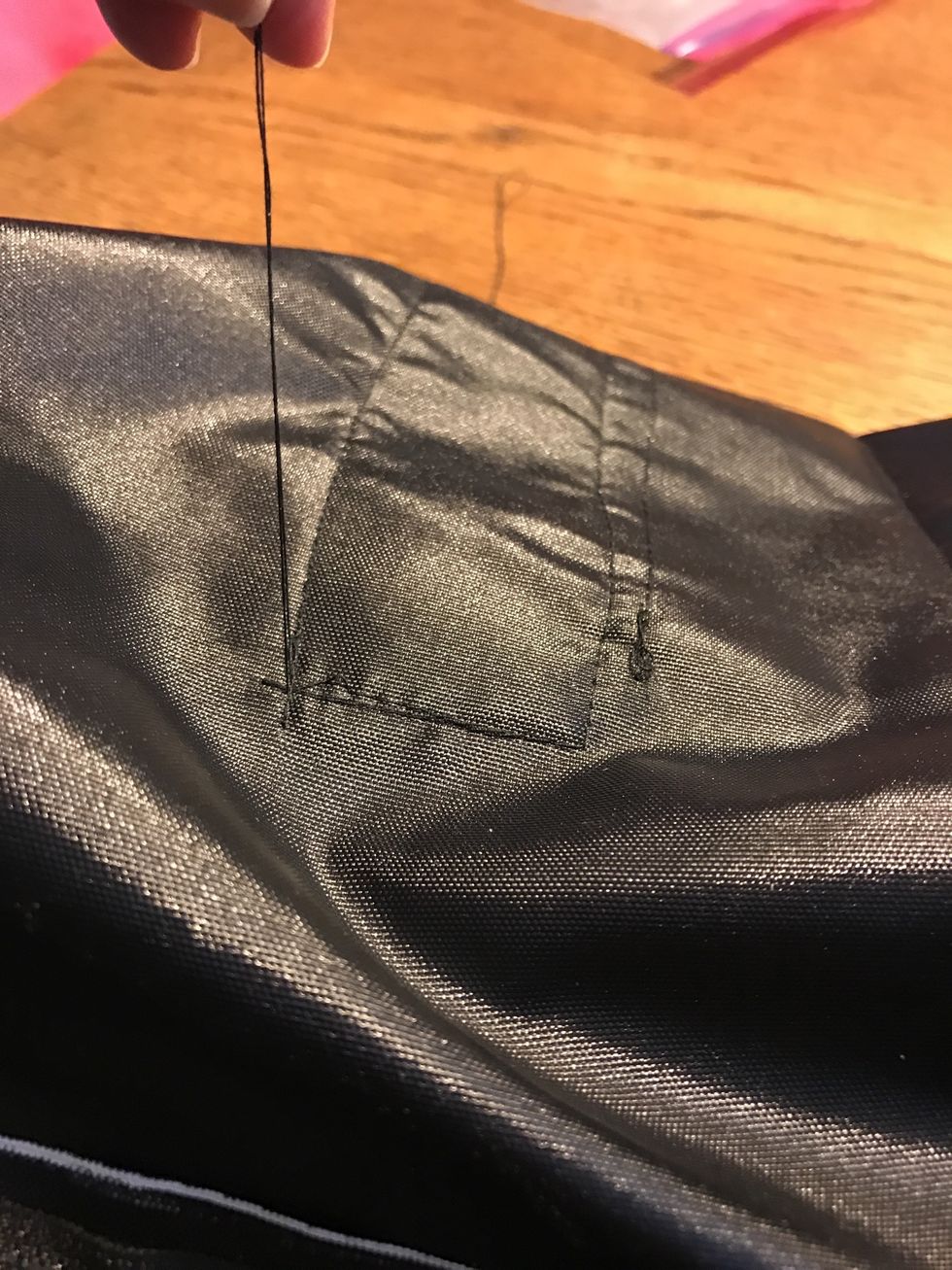 Trim up all of your loose threads and check for holes!