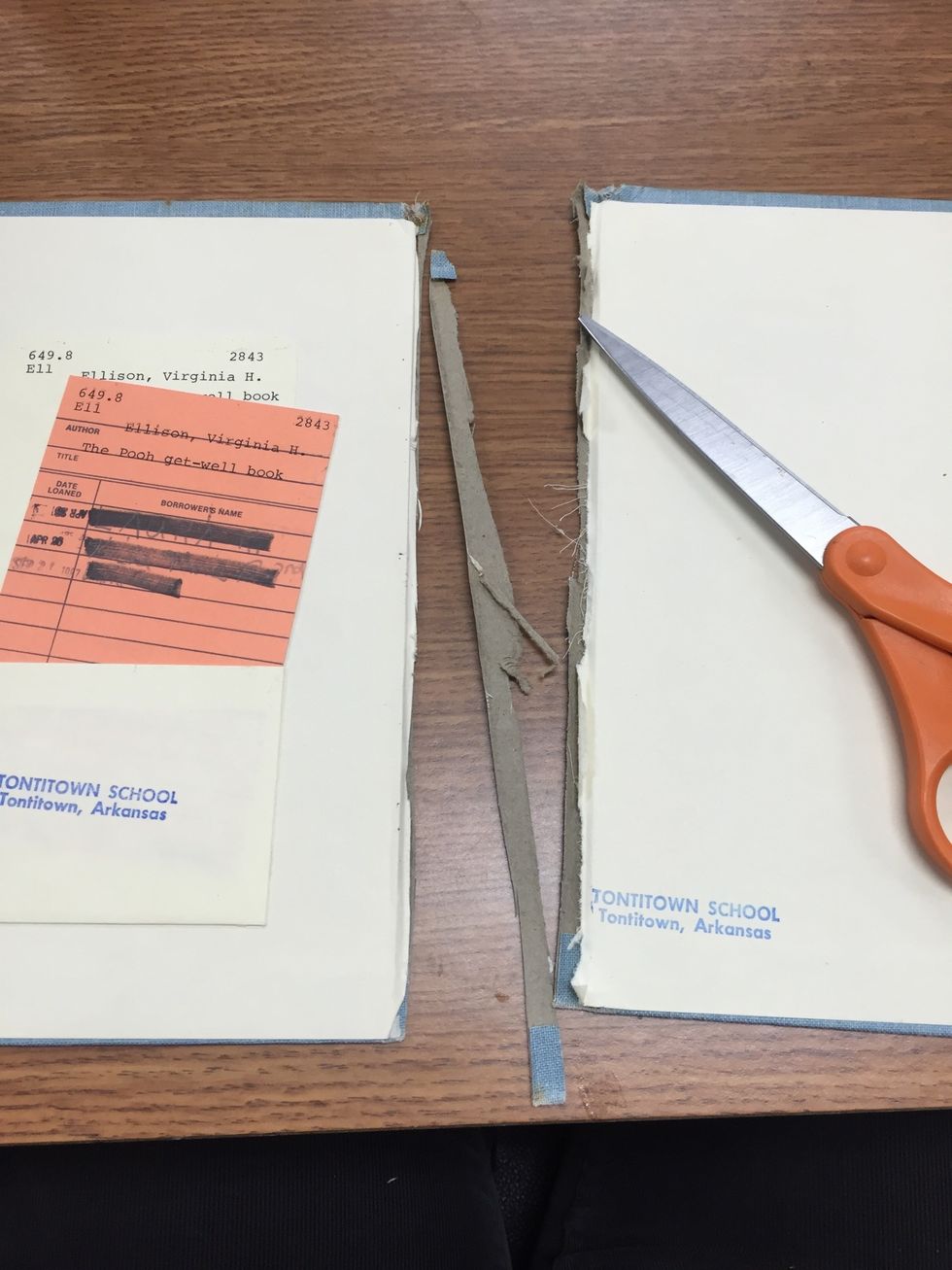 Trim up the edges of the book over.