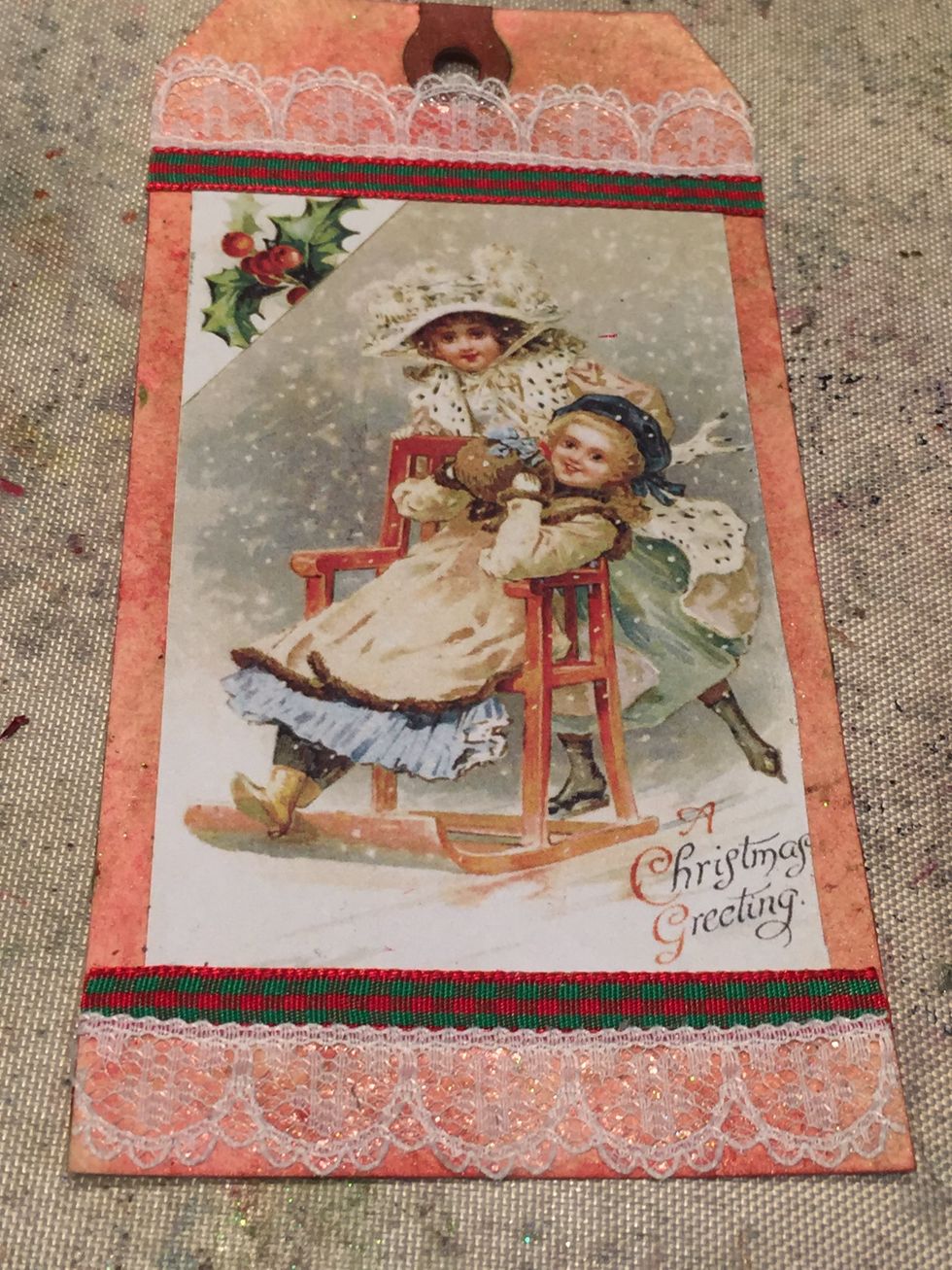Trip your image with ribbon and lace.  I used red and green ribbon and off-white lace.