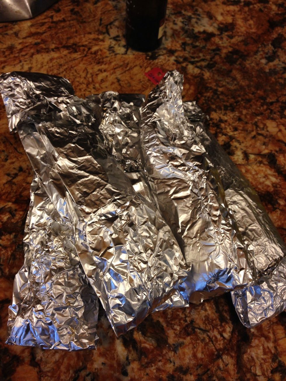 Try all kinda of combinations! Lemon, butter and salt was my favorite! I also like the one stuffed with yoshidas! Then wrap securely in aluminum foil.