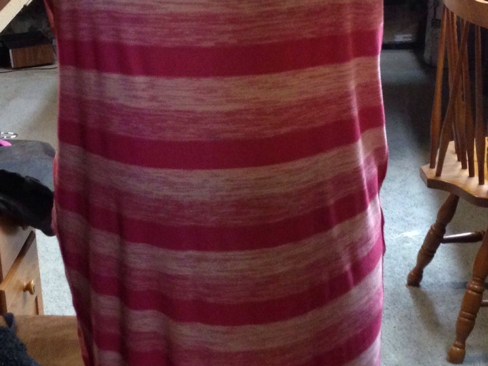 Try on and pull front down a bit to where you like how it sits. Mark again where you want waistband to go because previous mark isn't accurate anymore.