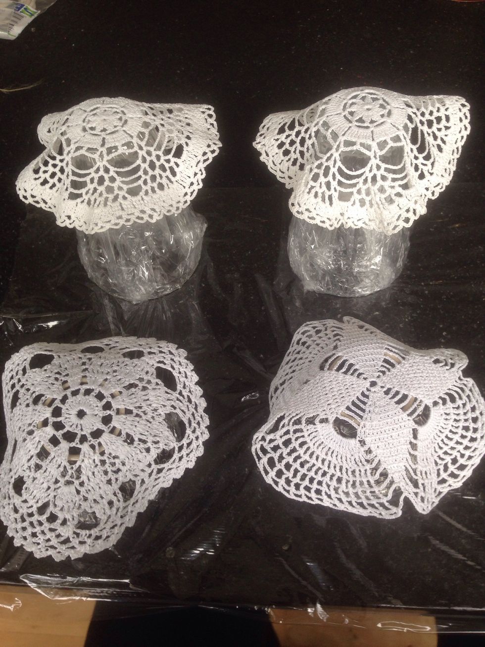 Try out the doilies on each form until you are satisfied with the shape. I found the thin laces worked best on the taller and thinner glasses, while the heavier laces worked good on the round bowls