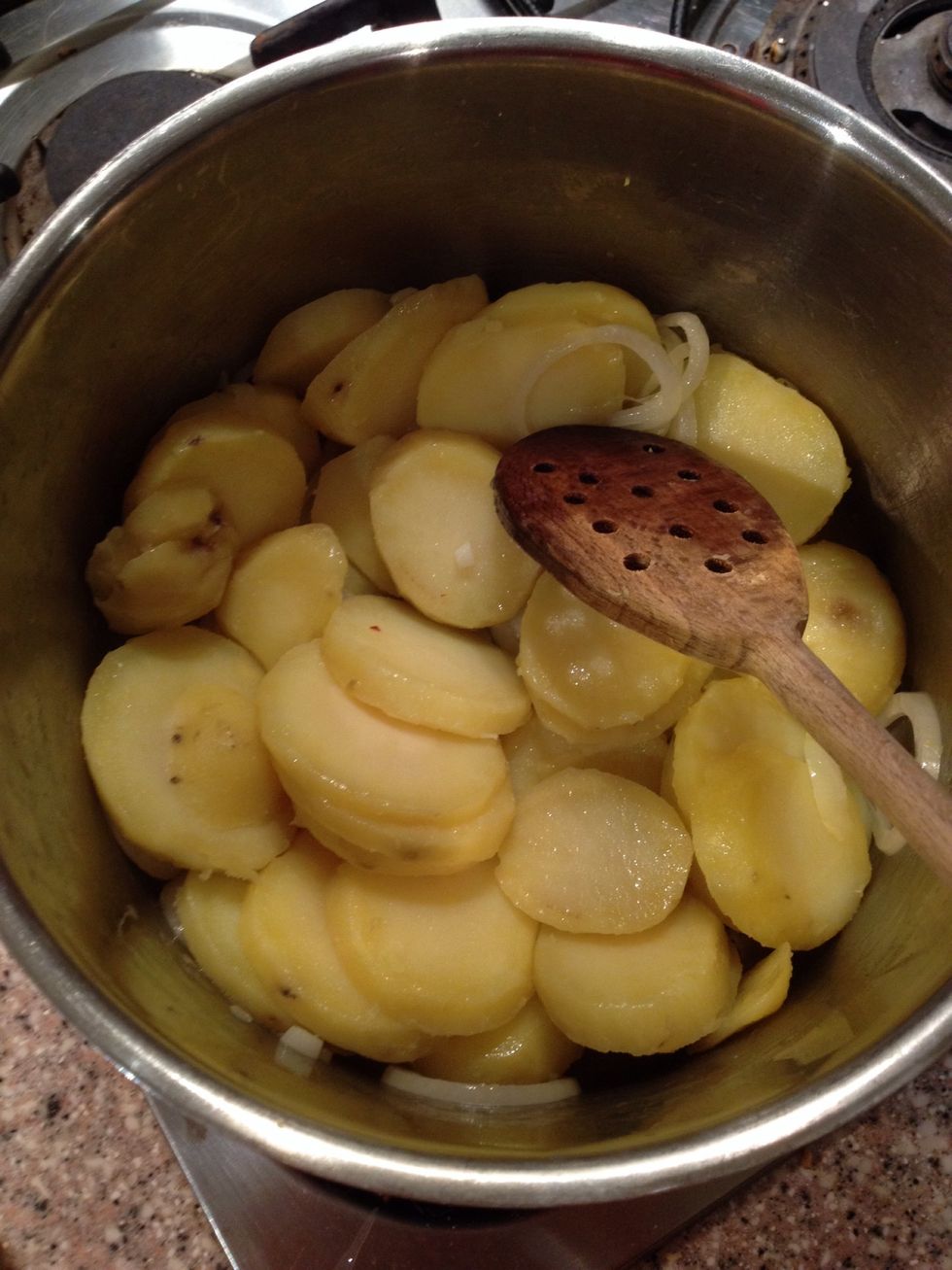 Try to slice your potatoes into even slices.