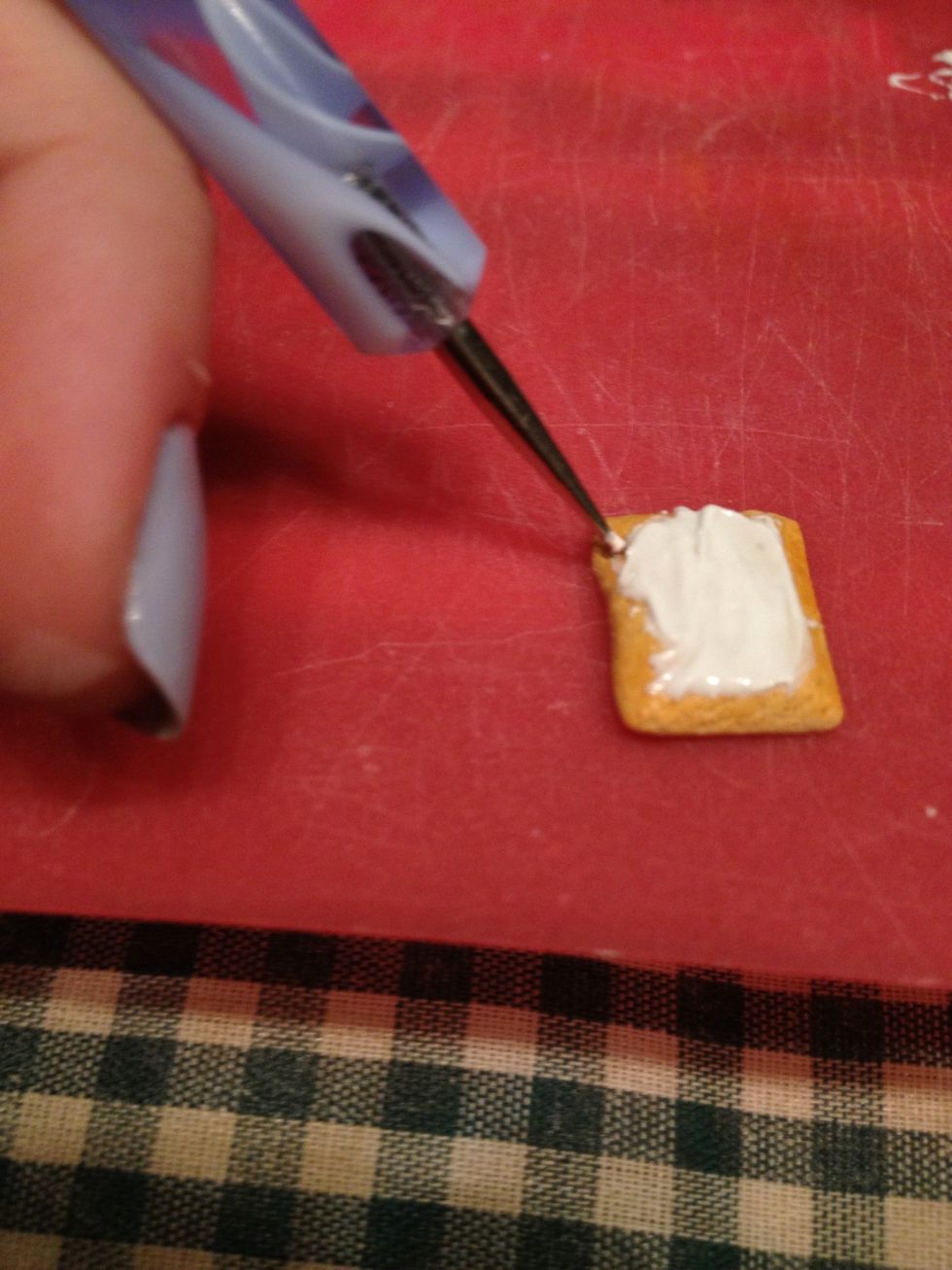Try your best to get it neatly on top - this part's a mess! Then use a dotting tool to make little indents along the edges