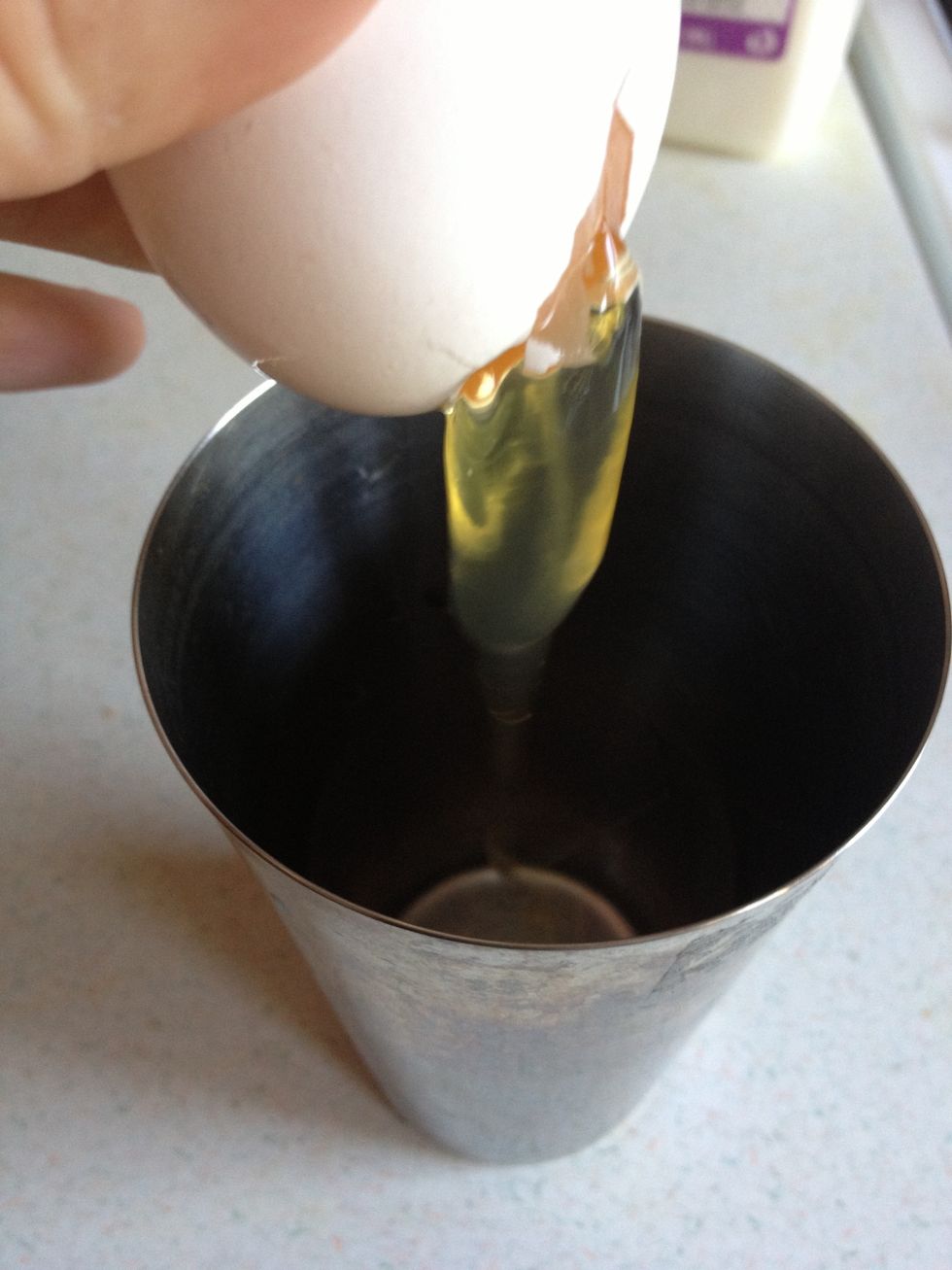 Trying to get the egg yolk. I used a fork to crack the egg.