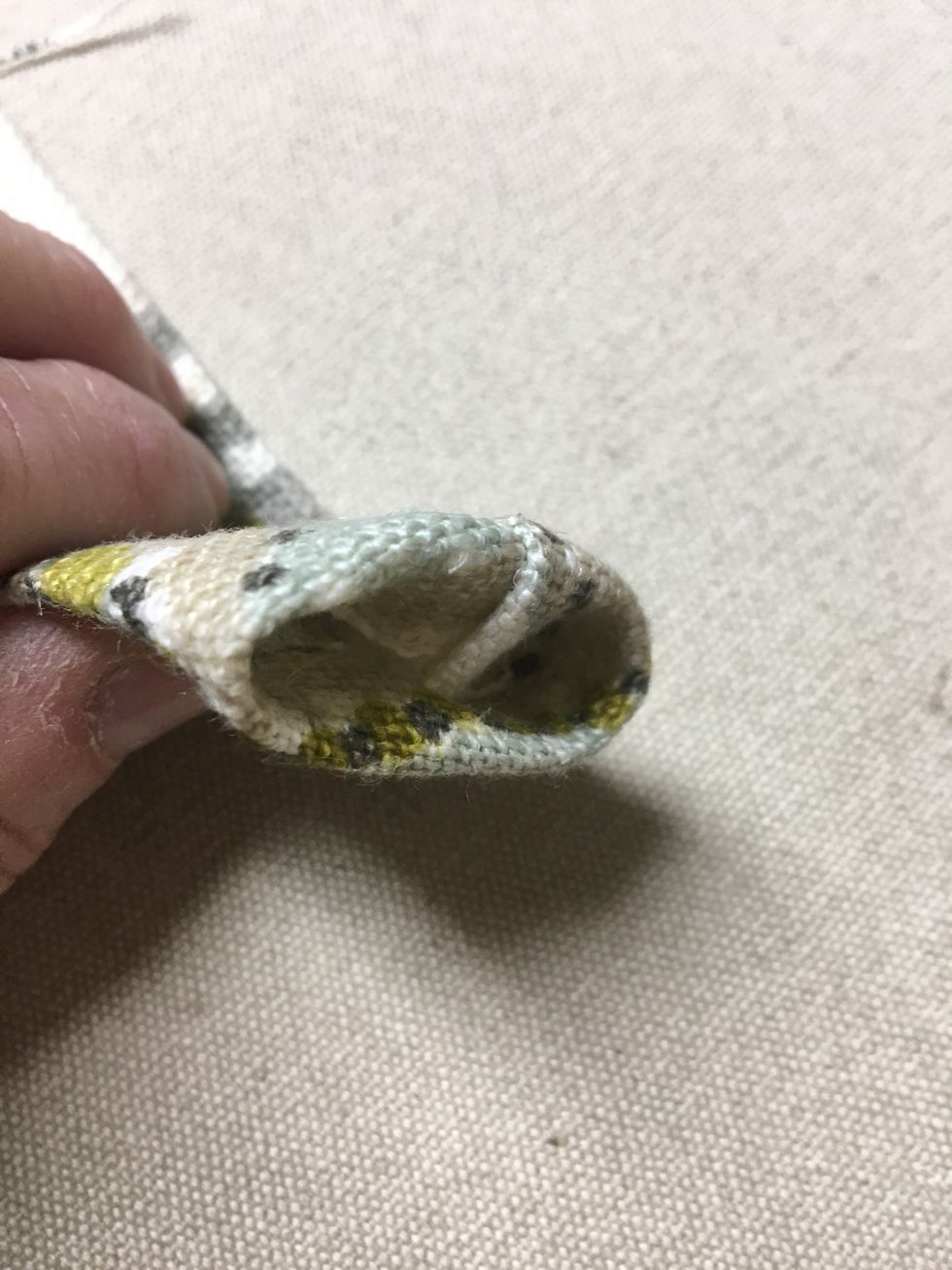 Tuck 1/2" into each end and press.