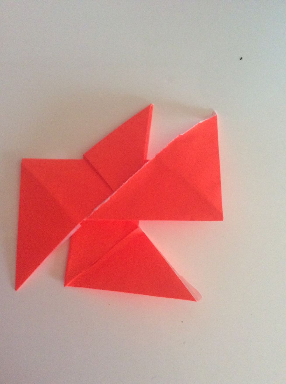 Tuck a comer into the pocket on the other piece.