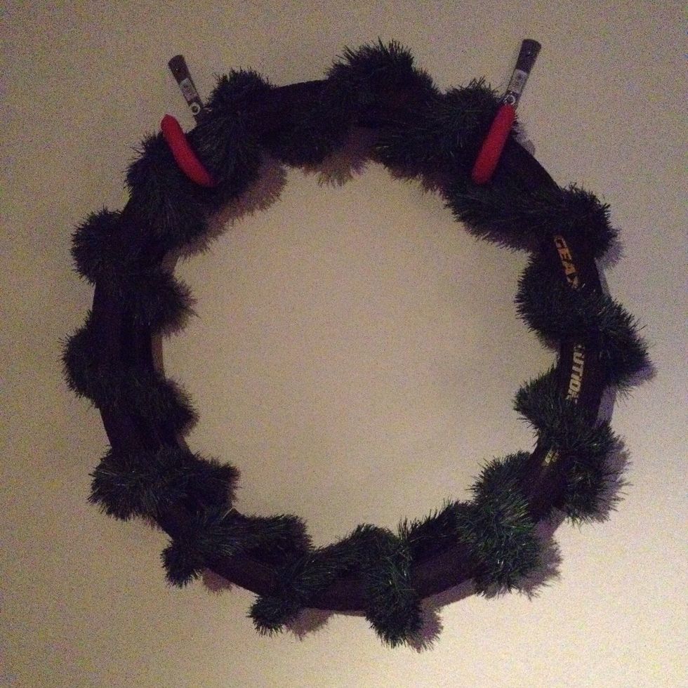 Tuck any extra garland inside one of the tires.