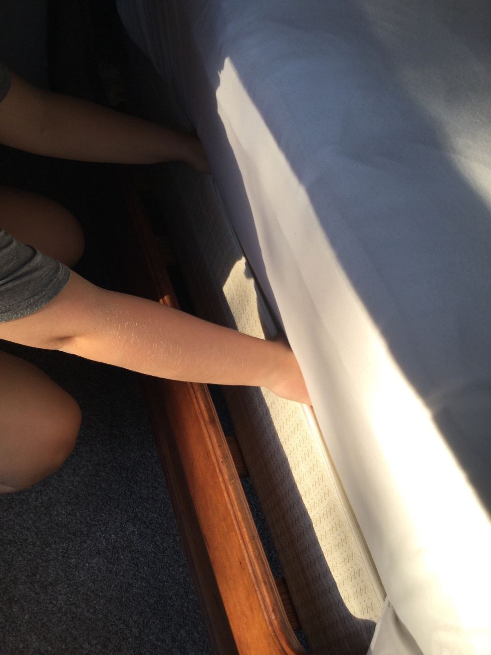 Tuck in any of the remaining fitted sheet under the mattress for all 4 sides of the bed