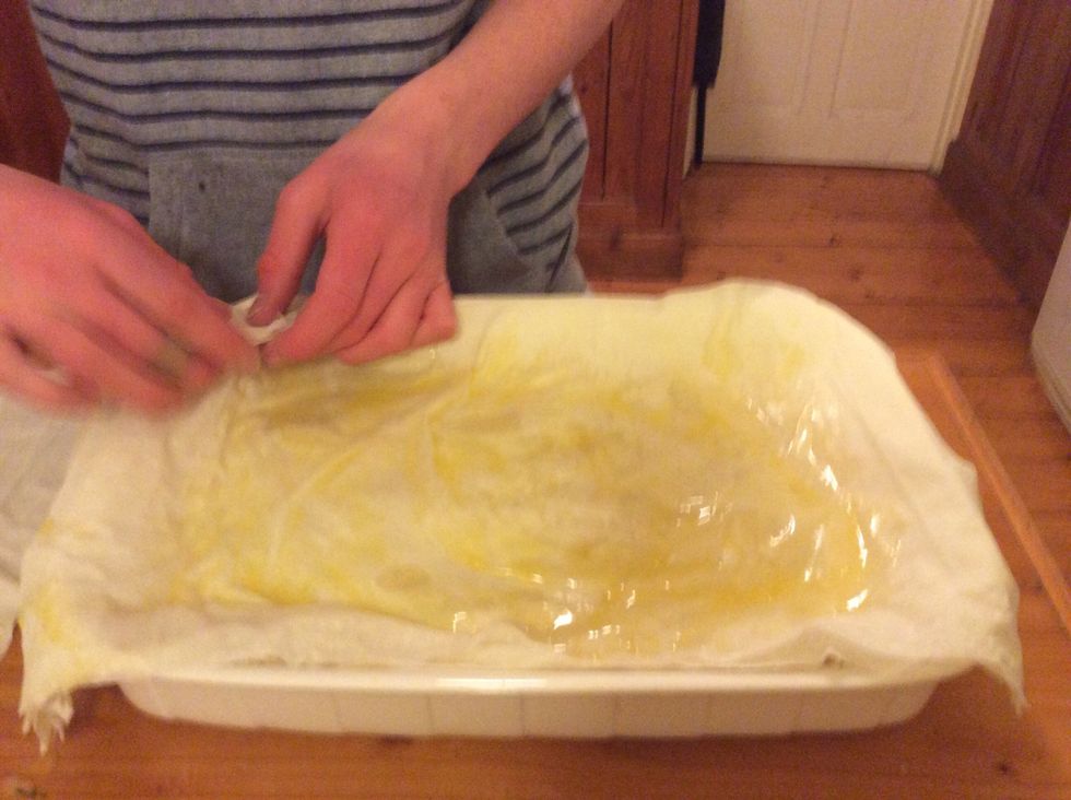 Tuck remaining pastry on the outside into the dish, to make sure you excess pastry burns and the spanakopita keeps together.