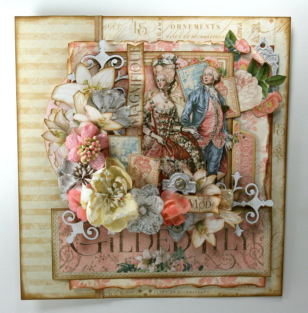 Tuck some additional fussy cut stamps from G45 Her Majesty. Use adhesive foam spacers to add volume to center of flower arrangement. Add another text strip ..this time going vertical.