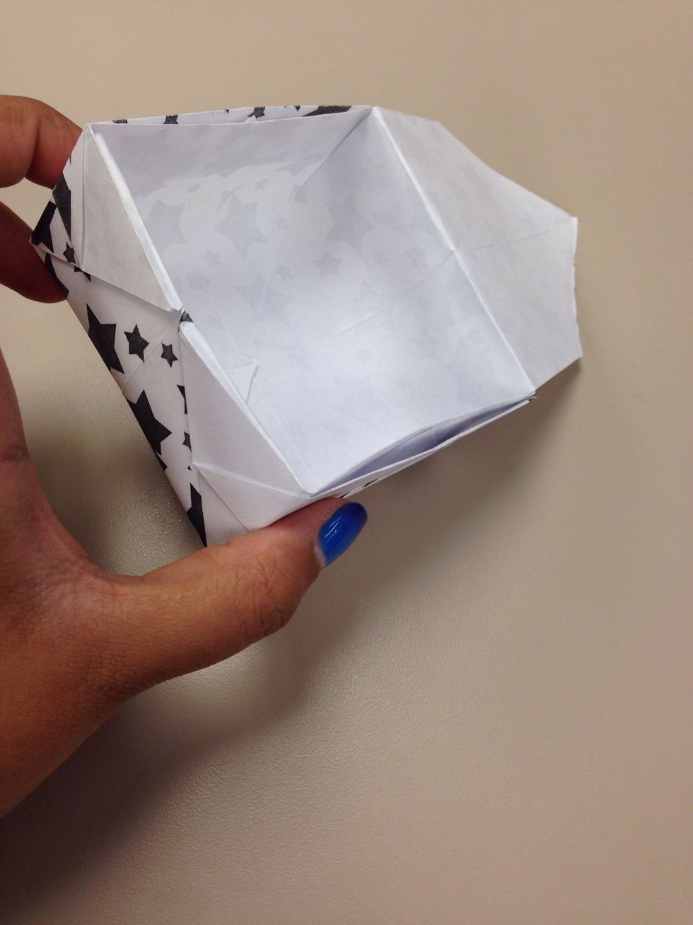 Tuck the loose flaps inside as shown