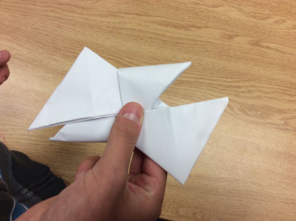 Tuck the other end into the other flap