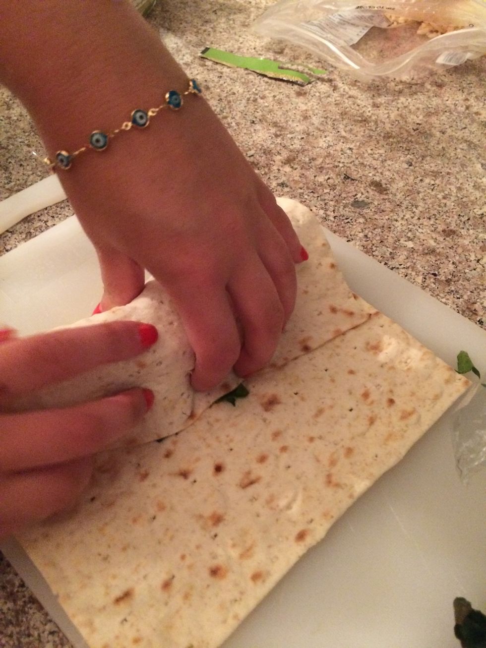 Tuck the side in once you've rolled it over.