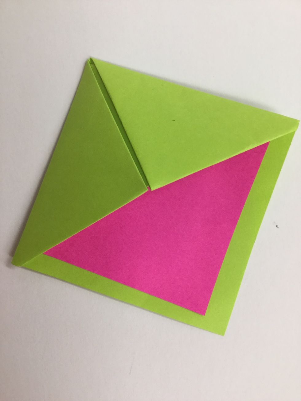 Tuck the square inside the bookmark to form the mouth.