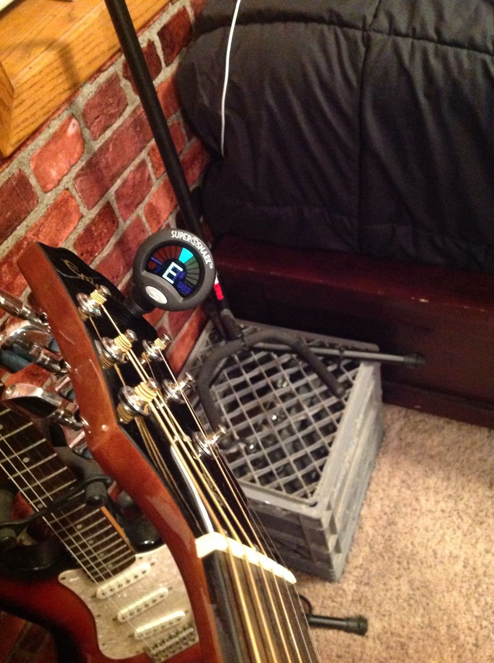 Tune the thickest, low string to E.