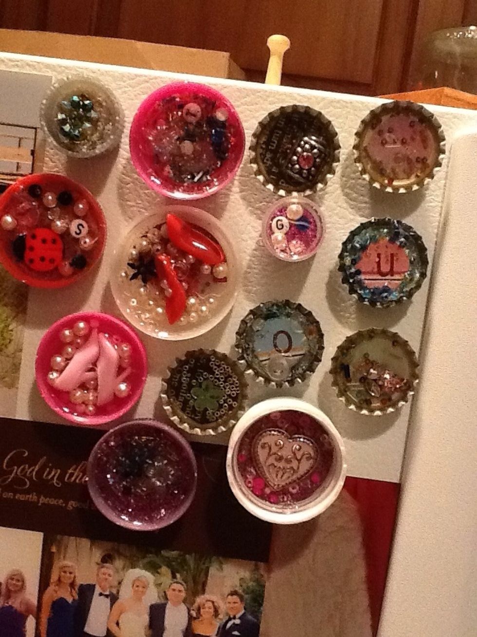 Turn all of your caps over. Glue one magnet to the back of each cap.  Set aside to dry.  Dry time roughly 2 hours. I usually do this step and then walk away from the project until they are dry.