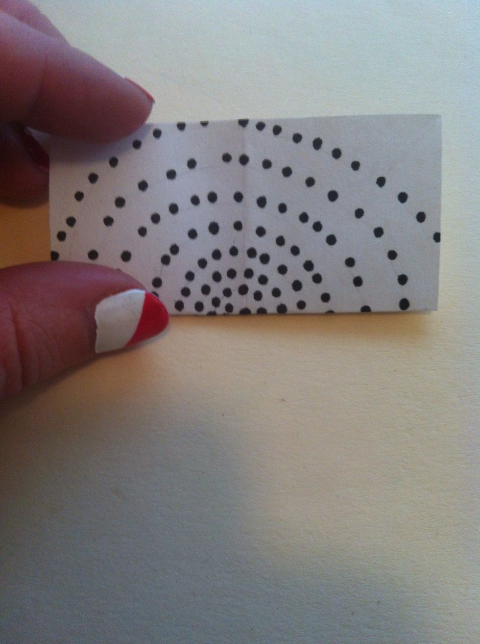 Turn and fold in half other direction like this. Unfold & you will see the creases formed cross.