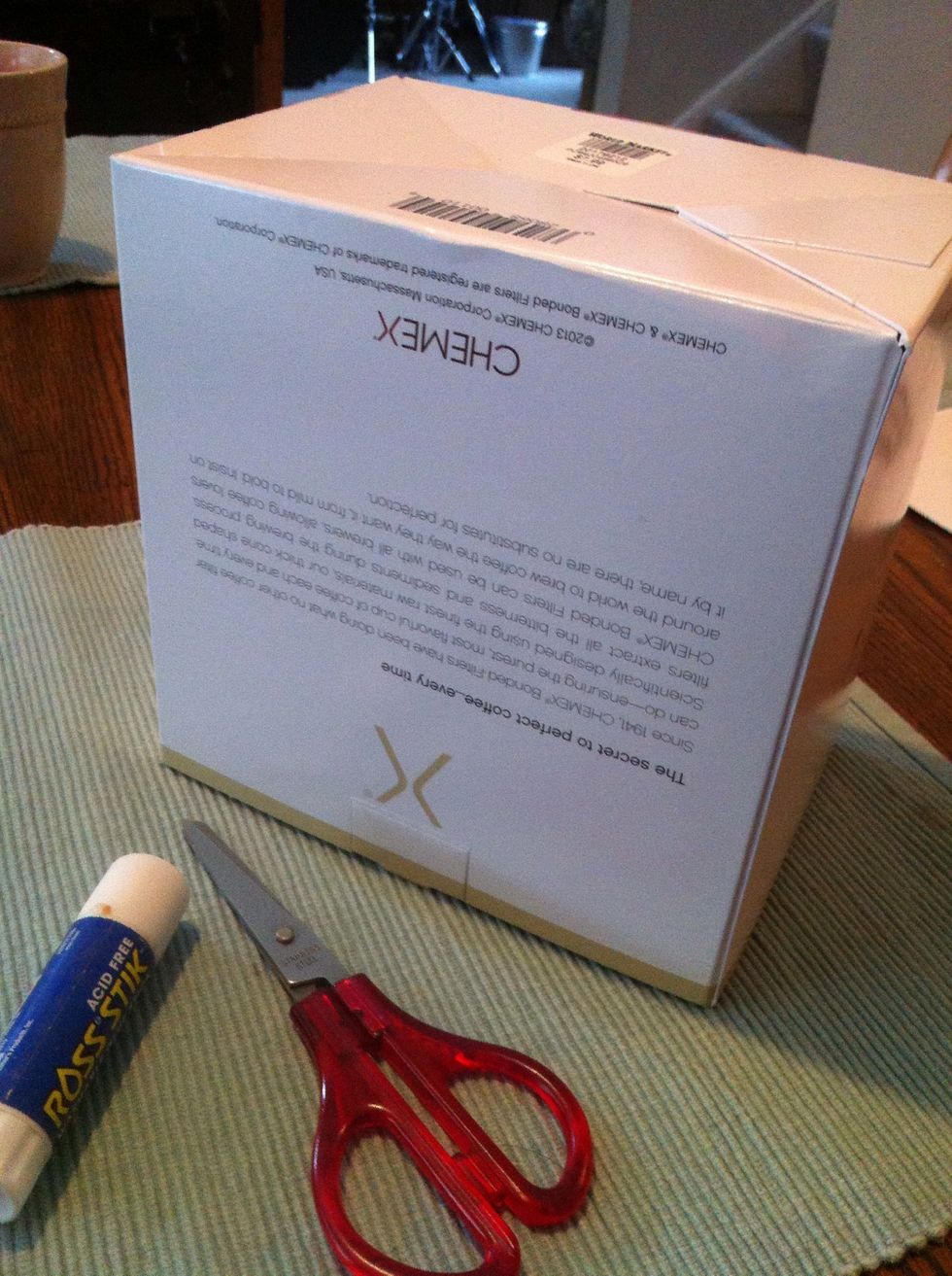 Turn box upside down to use the weight of the filters to get a good set. Wait until glue dries.