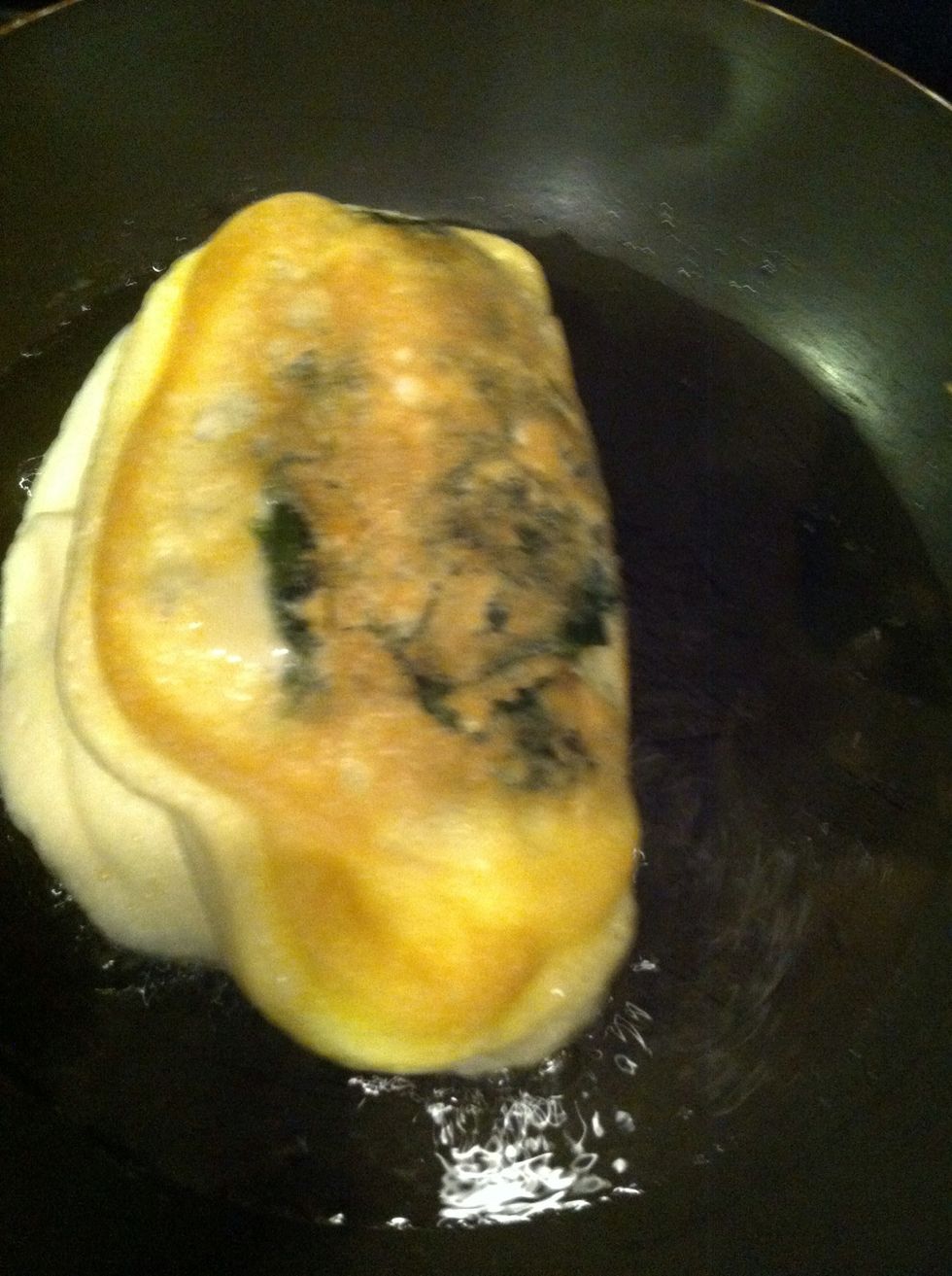 Turn carefully and cook