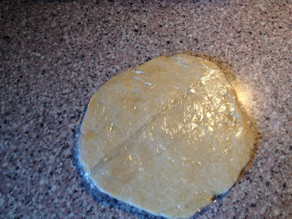 Turn dough onto sheet of plastic wrap and flatten into 4-inch disk. Wrap tightly and refrigerate for 1 hour. Before rolling dough out,let it sit on counter to soften slightly, about 10 minutes.