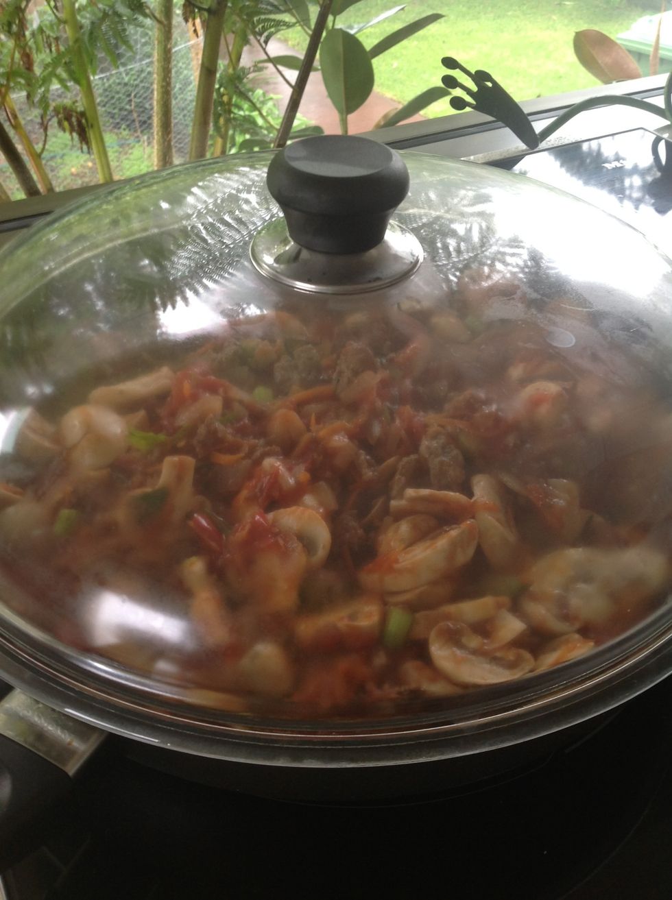 Turn heat down to a minimum and place lid on the pan to cook by itself. The longer you let it simmer, the more the flavours fuse throughout. Leave for a couple of hours on low heat.
