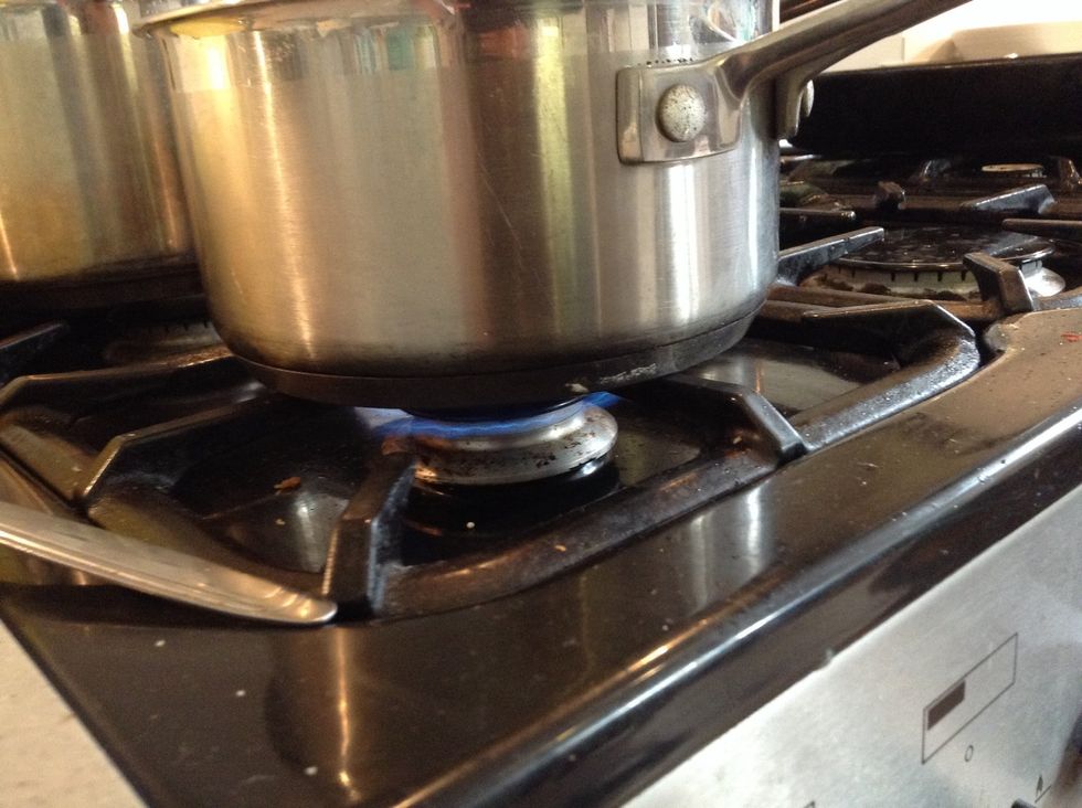 Turn heat on to smaller pot
