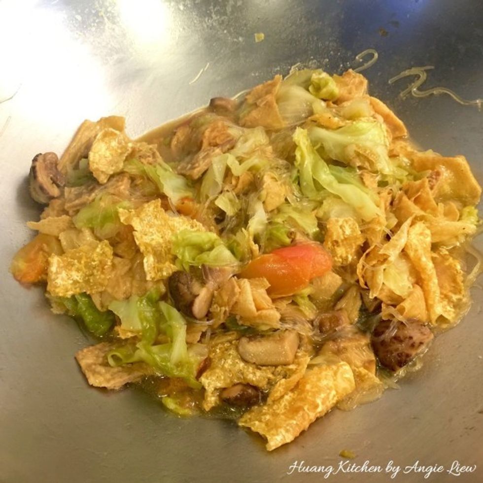 Turn heat to medium low and let simmer covered till beancurd skin has softened, about 5 minutes. And we're done! Taste and adjust seasoning as desired.