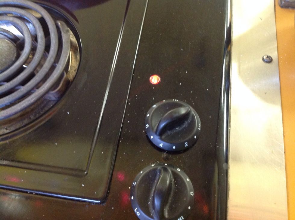 Turn heat to medium low to toast sesame seeds.