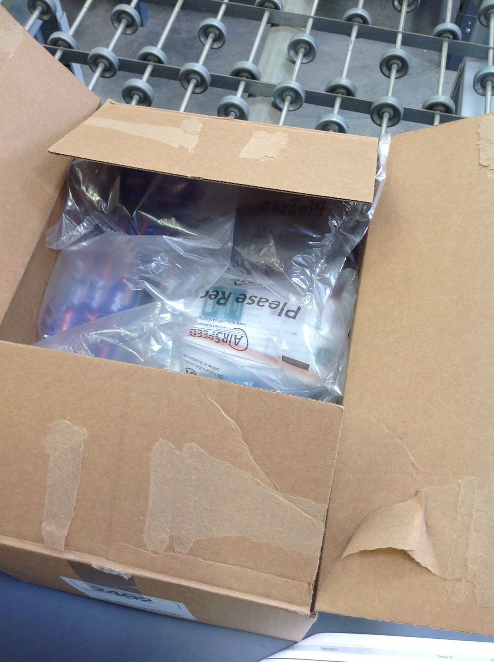 Turn in the small flaps on each side of the carton.