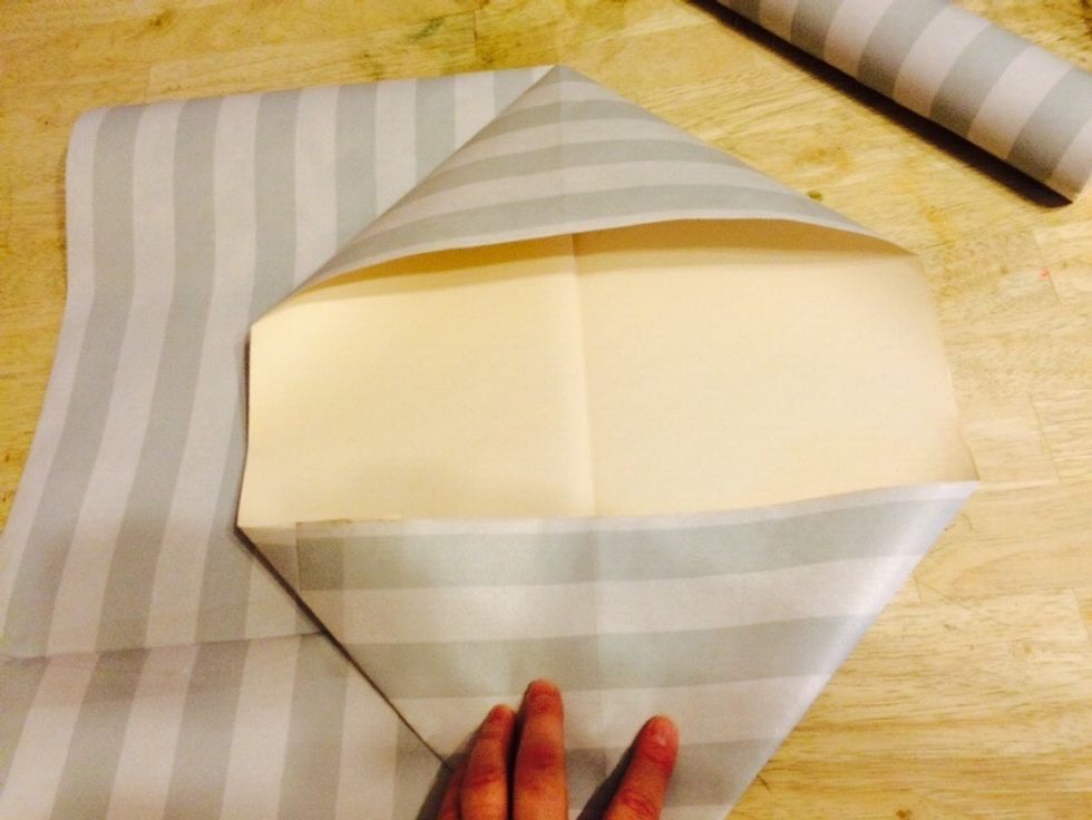 Turn it and fold other side.