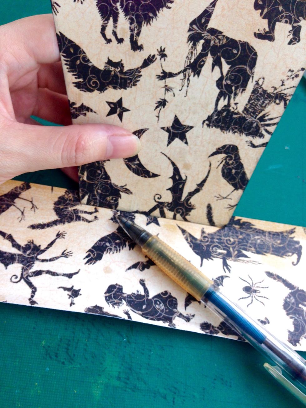 Turn it around and mark the base... You will have 2 pencil markings on the strip... Turn it down again to the other side, if it's longer, trim to fit...