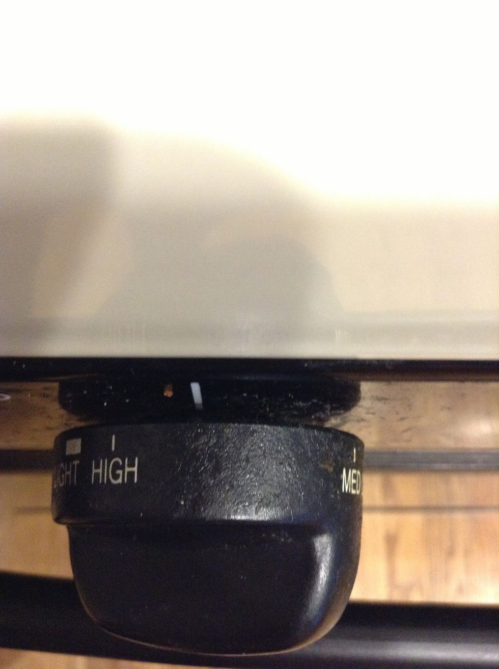 Turn it on to medium high until the water starts to boil