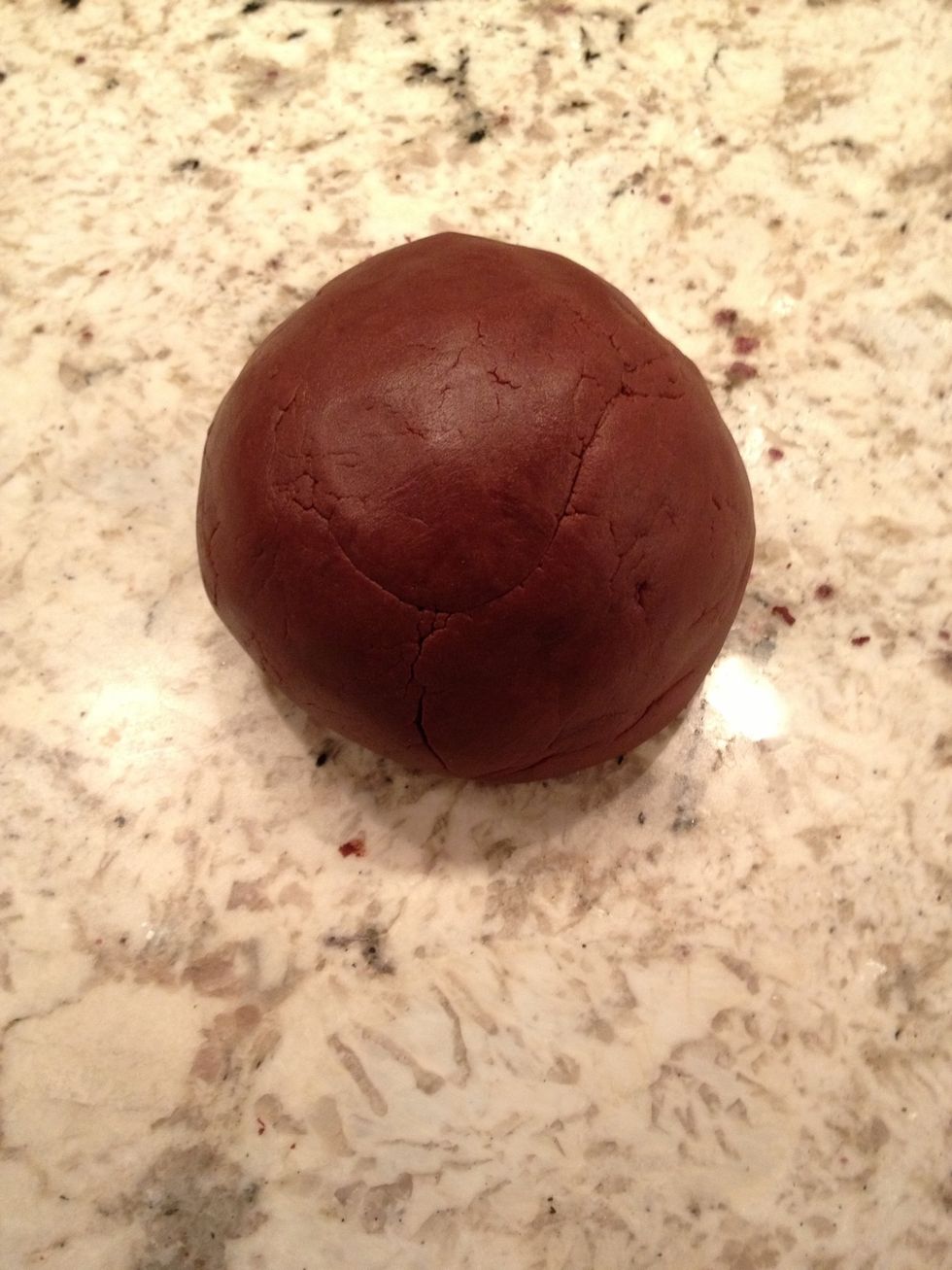 Turn it out onto a clean work surface and knead it a few times. Roll it into a ball.