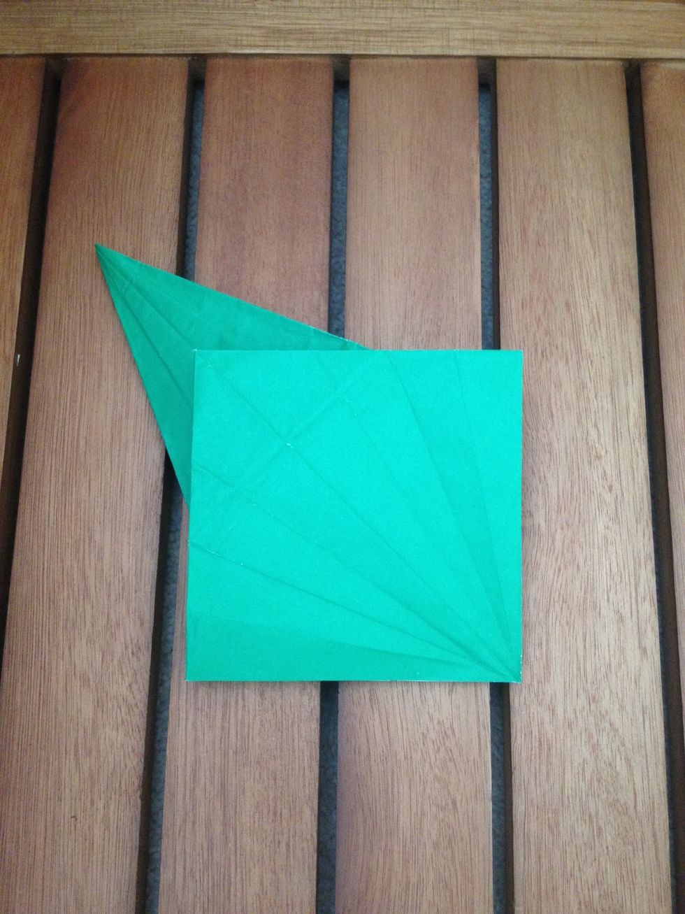 Turn it over. Now you have a square with a weird pointy head?