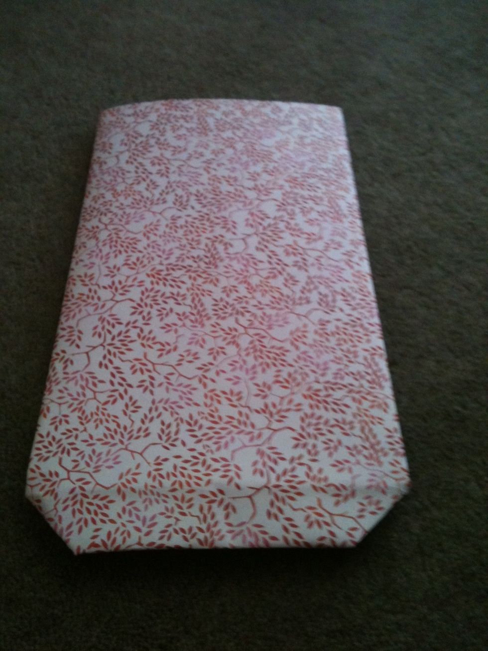 Turn it over to the side that hasn't got sticky tape on it