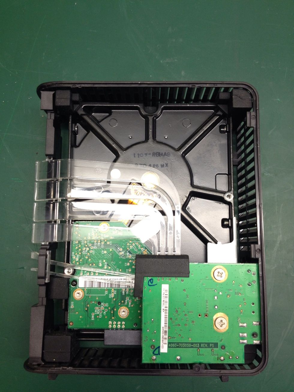 Turn it over where you will see the PCB's (Printed Circuit Boards).