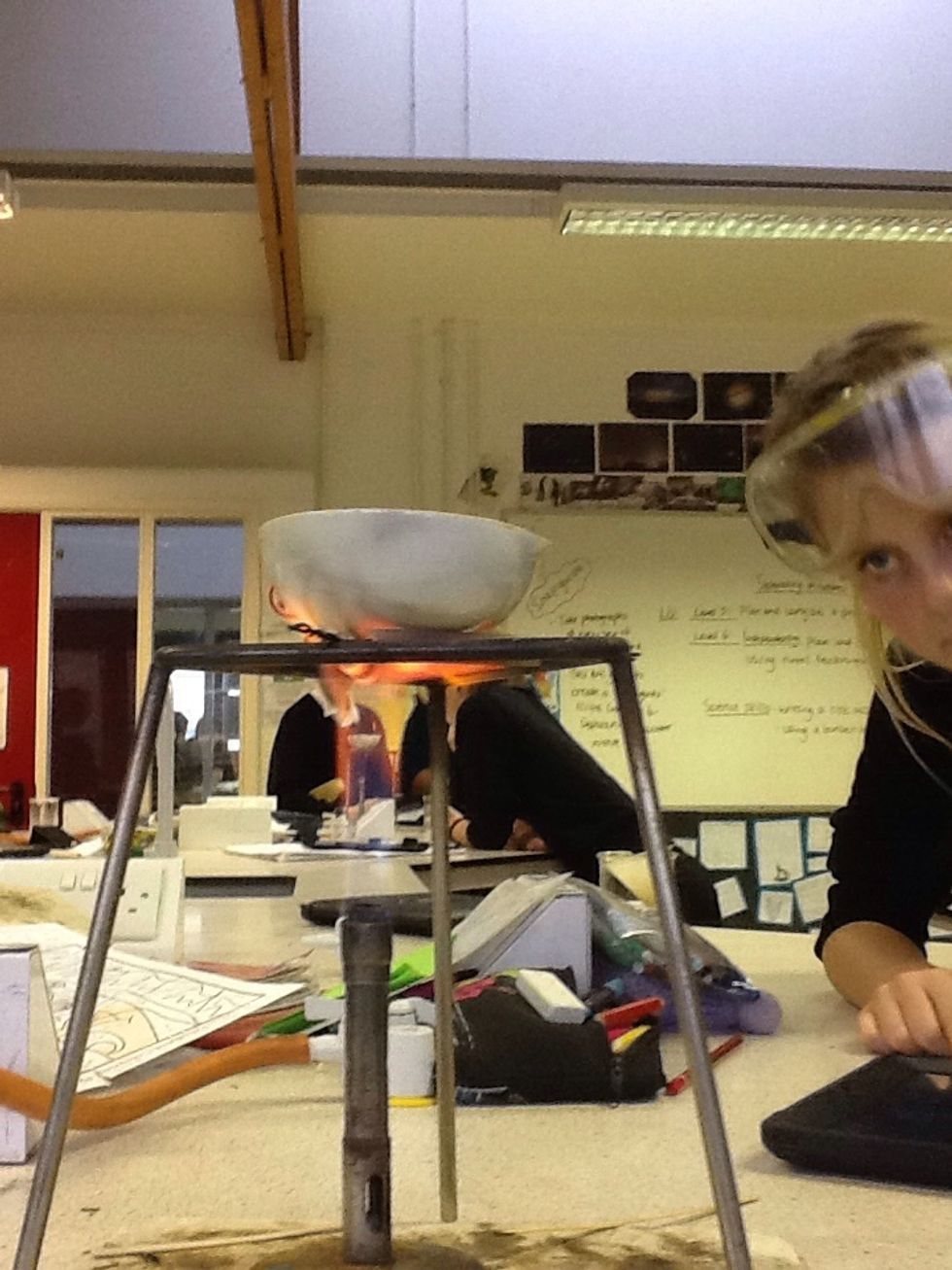 Turn it up on to the blue flame and put your pot on top,