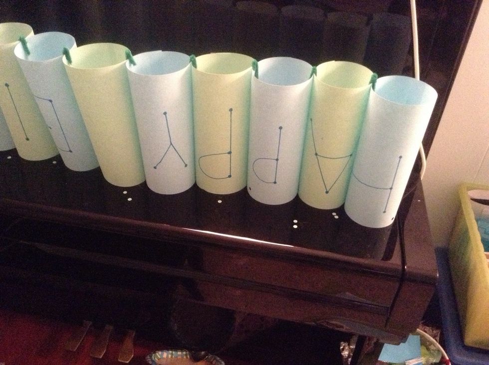 Turn it upside down, punch holes on the tubes and loop more pipe cleaners through.