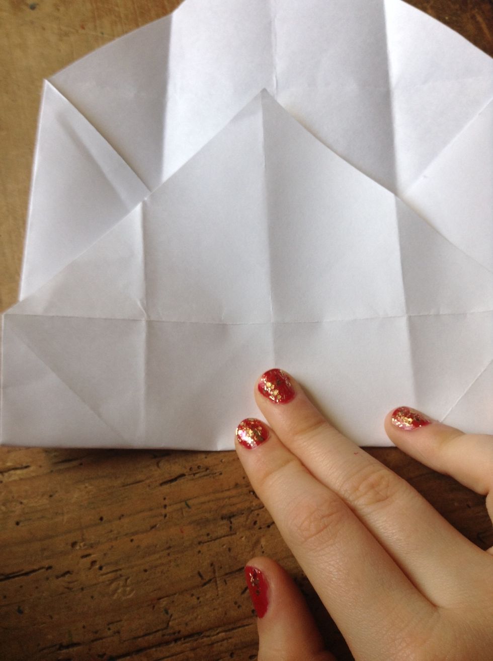 Turn it vertical and then fold to make a side