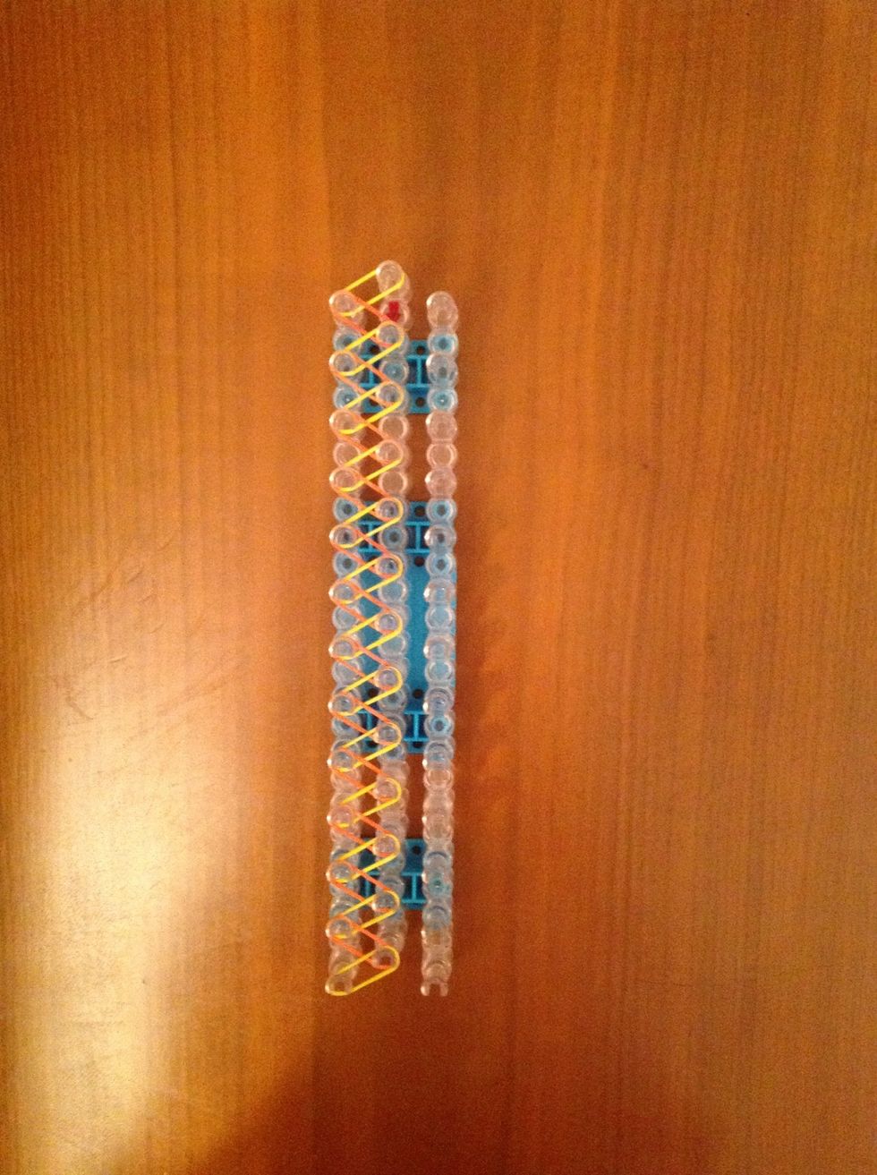 Turn loom around so that the red arrow is pointing towards you.