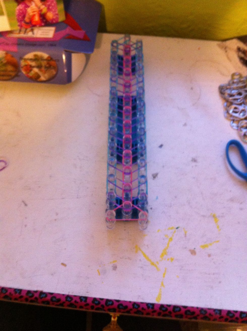 Turn loom over so the arrow is facing you