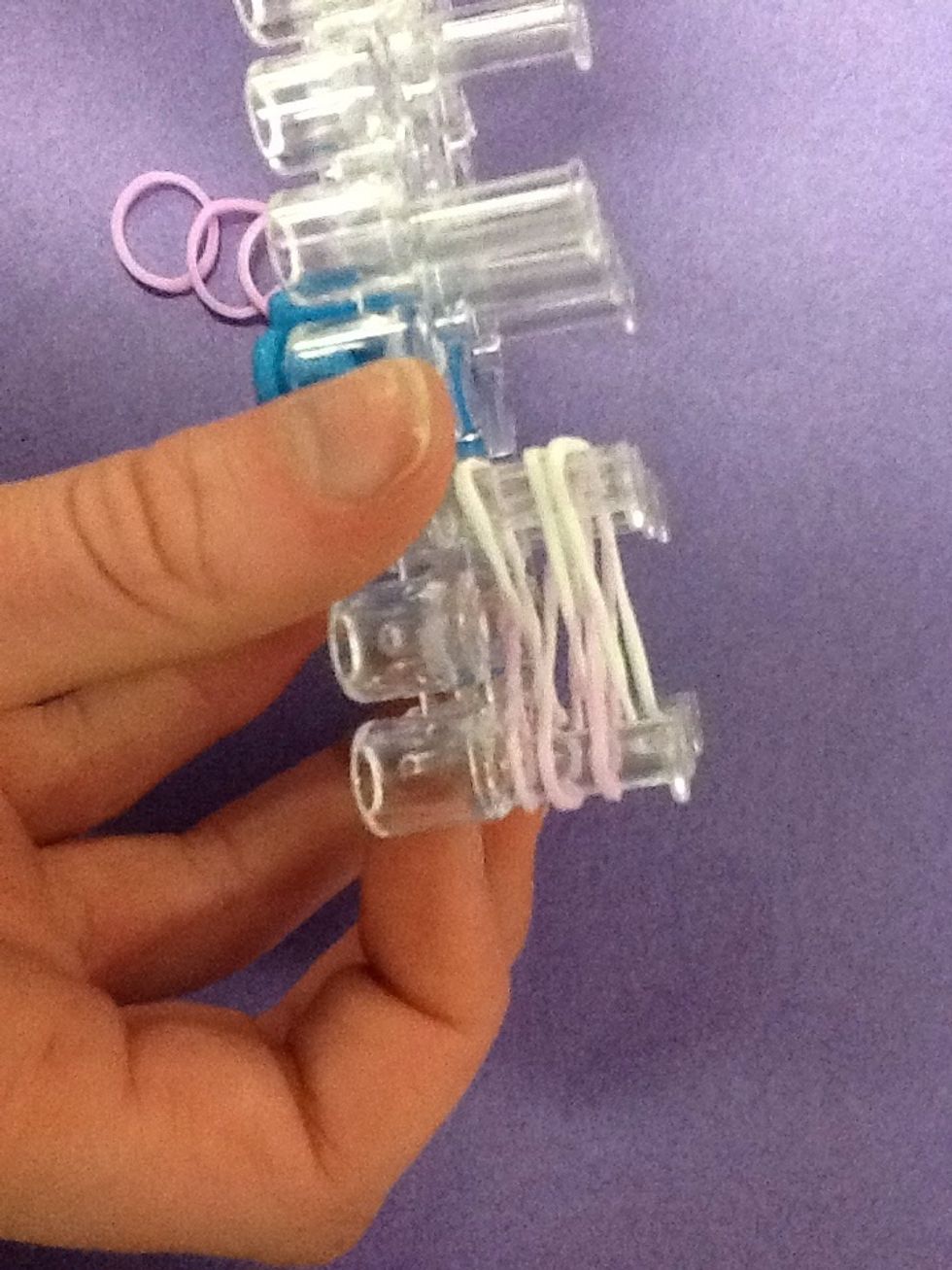 Turn loom so the side faces you.