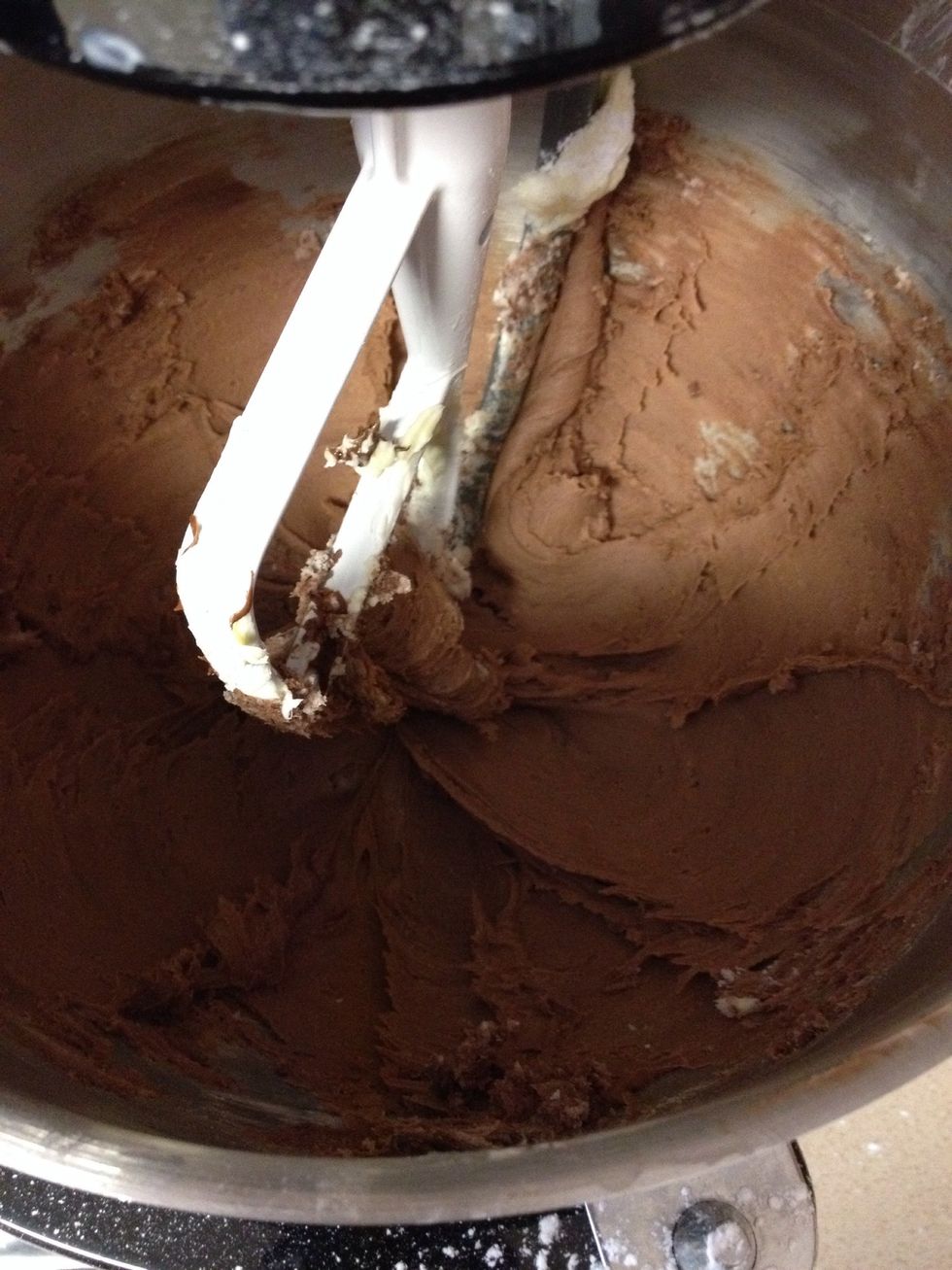 Turn mixer on low and add one tablespoon of milk at a time until whipped, lighter in color, and your preference for buttercream consistency