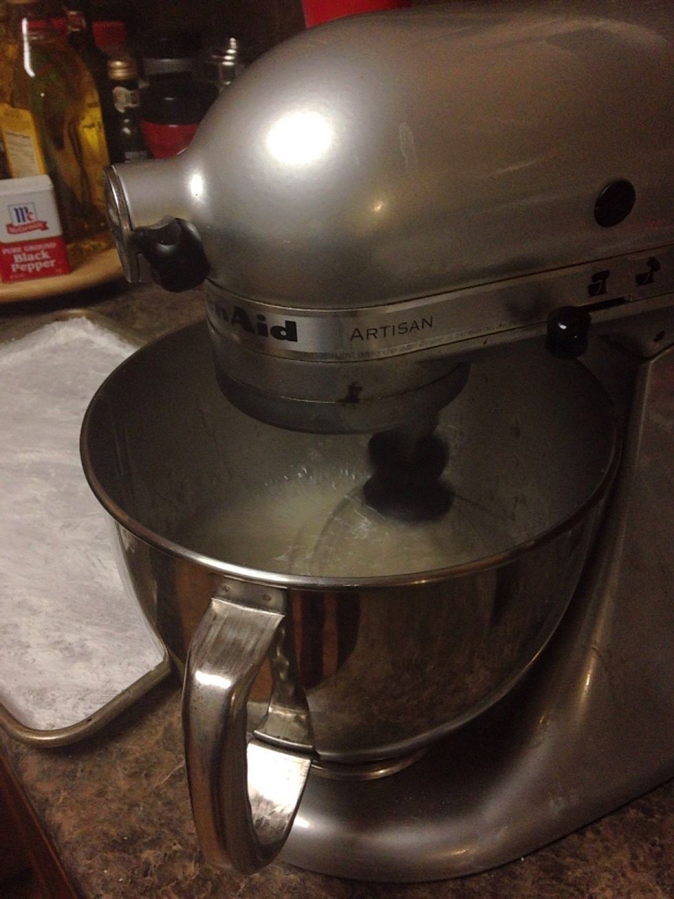 Turn mixer to high and go get your pan ready. You have roughly 10 minutes. Check mixer occasionally to make sure it's not walking or smoking. The mixture is thick and can blow out a crappy mixer.