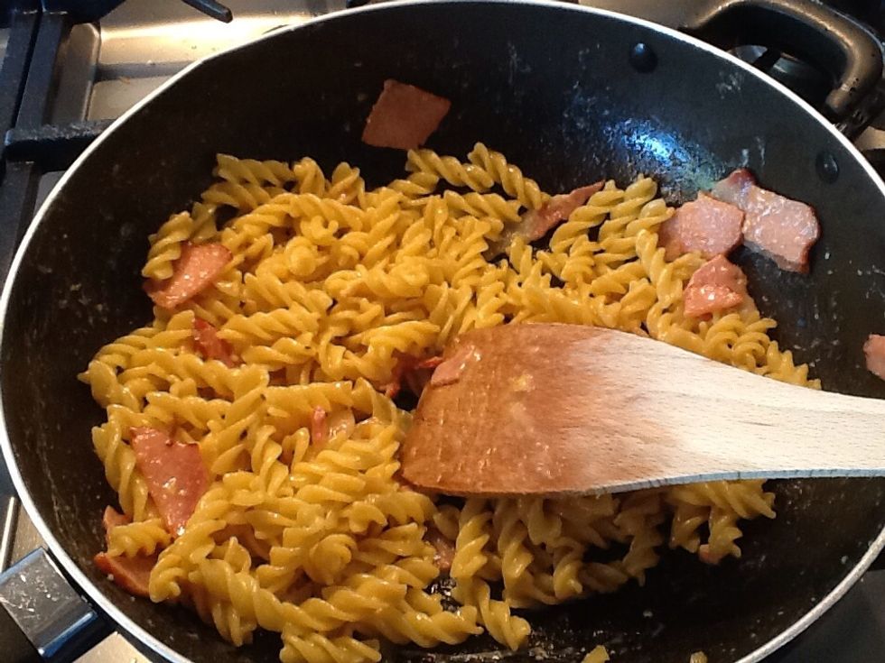 Turn off heat and add egg and cheese mix. Mix together , carefully not to over mix, or scramble the egg.