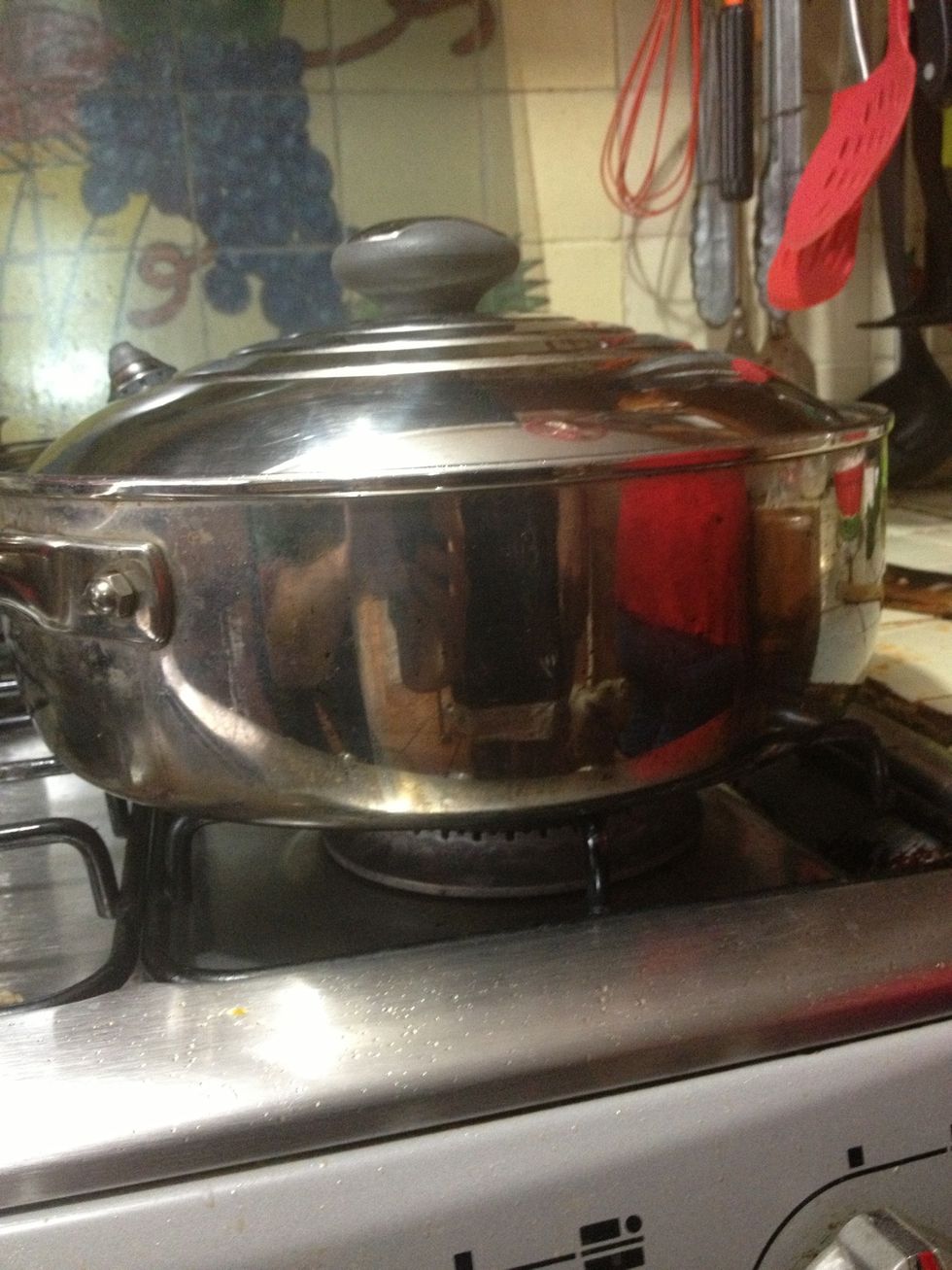 Turn off the fire, put the lid back on and let it sit for 10 mins aprox so the rice takes in the rest of the water without burning :)