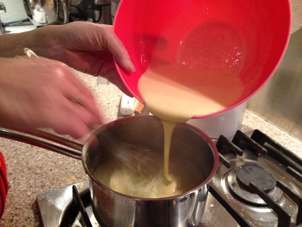 Turn off the heat and add half of the egg whisk to the tapioca while you are whisking.